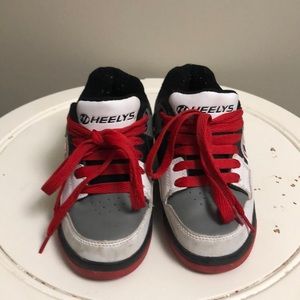 Red and grey Heelys.